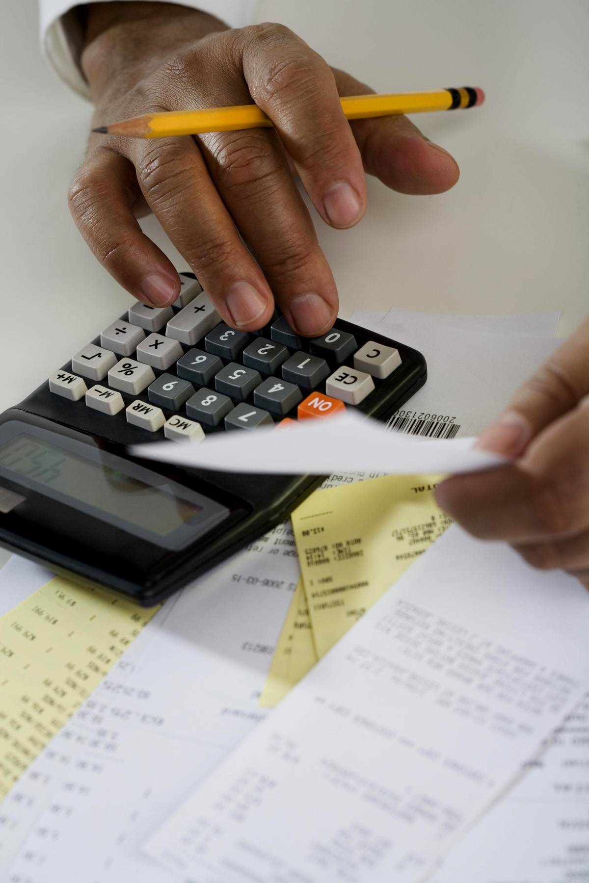 woman using calculator