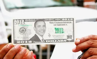 Presidential Currency - Ms. Dinetta Gilmore was proudly selling Obama money for one dollar! Could this become reality? How much would an Obama dollar be worth?&nbsp; (Photo: Angel Elliott/BET)