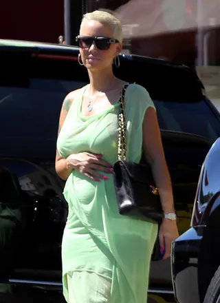 Baby on Board - Amber Rose is spotted resting her hand on her belly while&nbsp;shopping in West Hollywood.&nbsp;(Photo: FameFlynet)