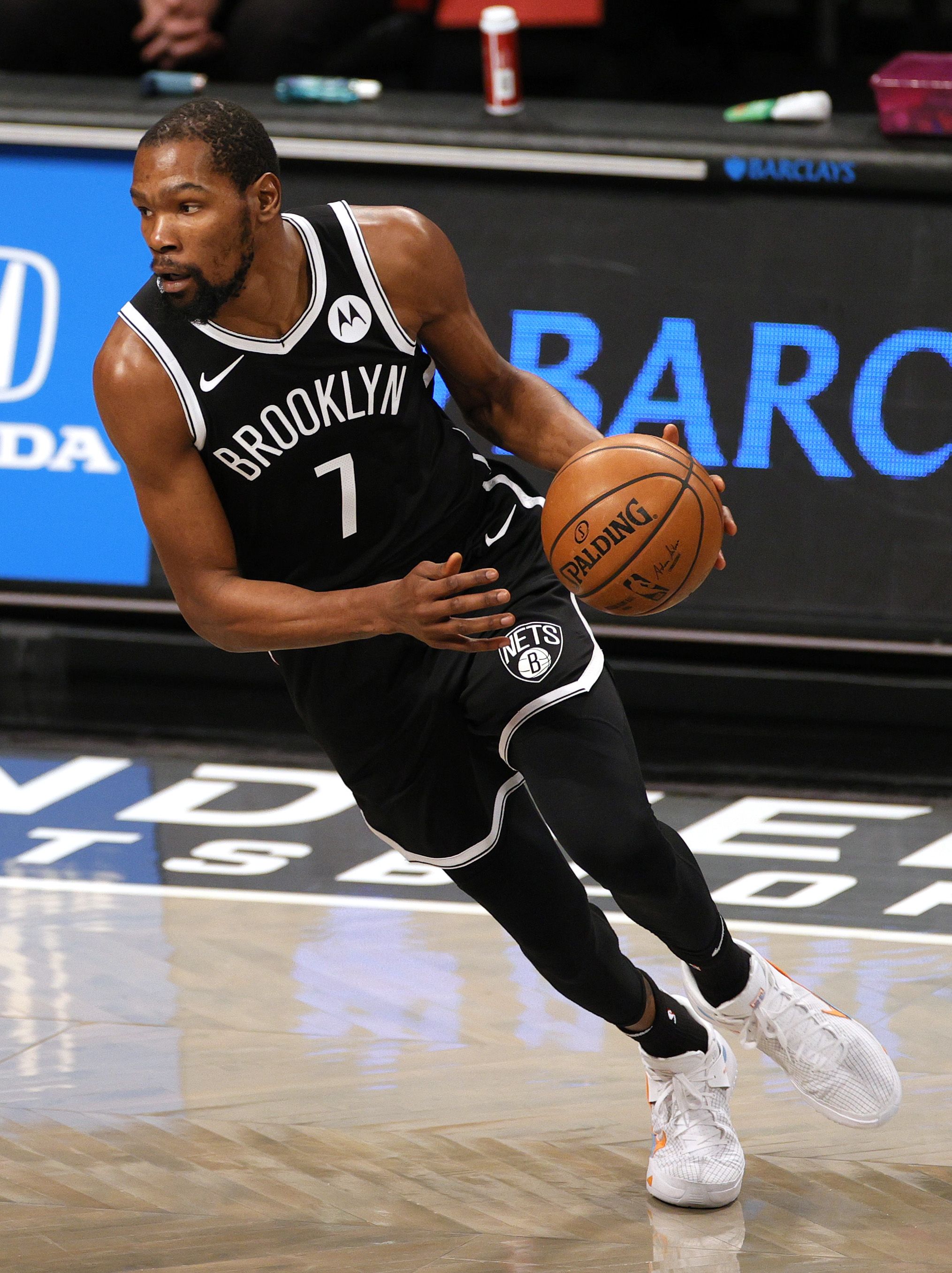 NEW YORK, NEW YORK - JANUARY 01: Kevin Durant #7 of the Brooklyn Nets dribbles the ball during the first half against the Atlanta Hawks at Barclays Center on January 01, 2021 in the Brooklyn borough of New York City. NOTE TO USER: User expressly acknowledges and agrees that, by downloading and/or using this Photograph, user is consenting to the terms and conditions of the Getty Images License Agreement. (Photo by Sarah Stier/Getty Images)
