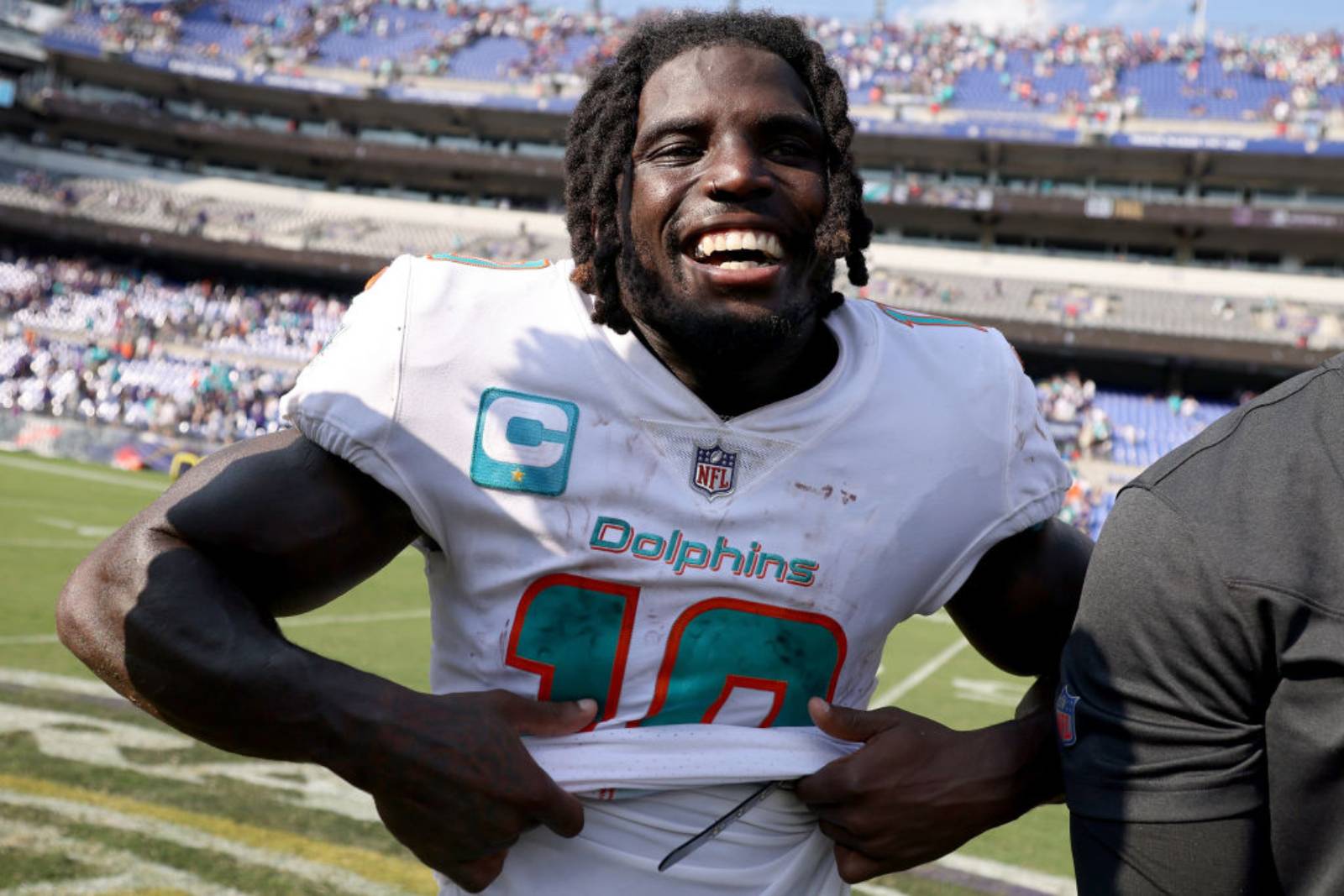 Tyreek Hill #10 of the Miami Dolphins celebrates after a 42-38 win over the Baltimore Ravens at M&T Bank Stadium on September 18, 2022 in Baltimore, Maryland. (Photo by Patrick Smith/Getty Images)