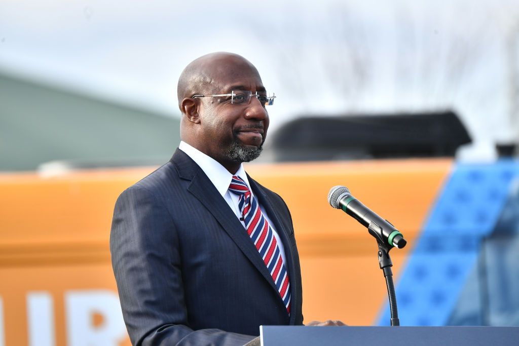 STONECREST, GEORGIA - DECEMBER 28:   Georgia Democratic Senate candidate Raphael Warnock speaks onstage during the "Vote GA Blue" concert for Georgia Democratic Senate candidates Raphael Warnock and Jon Ossoff on December 28, 2020 in Stonecrest, Georgia. (Photo by Paras Griffin/Getty Images)