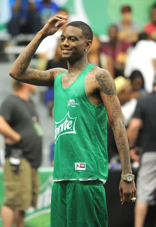 Superman  - Rapper Soulja Boy turns his swag on as he waits for his chance to show the L.A. crowd that he's a superhero on the court as well. (Photo: Noel Vasquez/BET/Getty Images for BET)