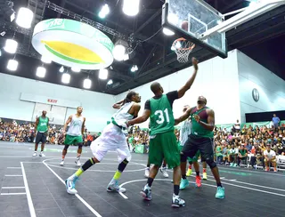 Hustle Play - Snoop Dogg tries to sneak in and grab an offensive board over Team Lime as the game came down the stretch. Snoop and Team Lime would go on to win the game 69-67 in overtime. (Photo: Noel Vasquez/BET/Getty Images for BET)