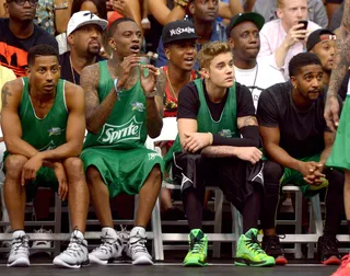 Team Players - Soulja Boy and Justin Bieber were the ultimate teammates. When they weren't in the game they were actively cheering their squad on from the bench. (Photo: Jason Kempin/BET/Getty Images for BET)