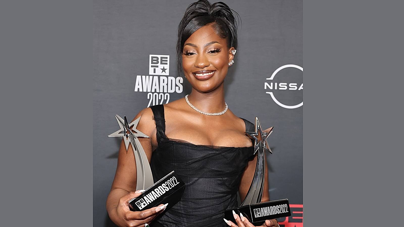 JUNE 26: Tems poses in the press room during the 2022 BET Awards at Microsoft Theater on June 26, 2022 in Los Angeles, California.  