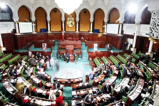 Death Threats Suspend Tunisia Constitution Debate - Voting between Tunisia’s secular lawmakers on a new constitution was halted due to anonymous death threats to members of the parliament. Lawmakers look to approve the new charter so that a caretaker government can reside over the current state that is divided between Islamists and secular opponents.&nbsp;(Photo: Aimen Zine/AP Photo)