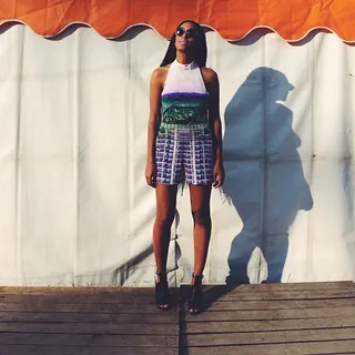 Pretty Ms. Sunshine  - No one wears prints better than Solange. No one. Open-toe mules and round sunglasses add just the right edge to this covetable print romper. (Photo: Solange via Instagram)