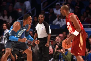 Clash of the Titans - Kobe Bryant (24) of the Los Angeles Lakers looks to pass as he is defended by Dwight Howard (12) of the Orlando Magic.&nbsp;(Photo: Ronald Martinez/Getty Images)