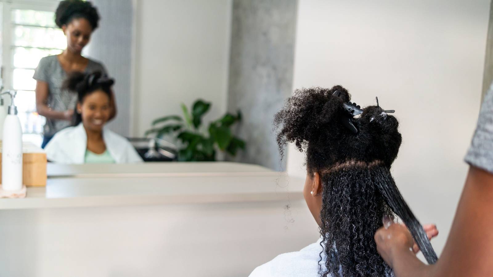 Hair stylist in Brazil. - stock photo
Photo of two brazilian woman. A client and a hair stylist.