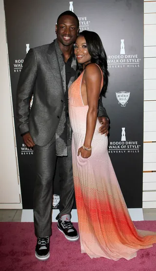 Night on the Town - Miami Heat point guard Dwyane Wade and Gabrielle Union strike a pose on the red carpet at the Rodeo Drive Walk of Style honoring Iman and Missoni. (Photo: FayesVision/WENN.com)