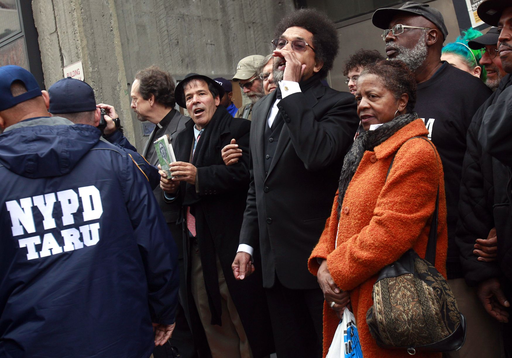 Cornel West Arrested at Stop and Frisk Protest in Harlem  - Acclaimed professor and civil rights activist Dr. Cornel West was arrested for the second time in a week on Friday, Oct. 14. While protesting against New York City’s Stop and Frisk policies, West and about 30 others were taken into custody on disorderly conduct charges while rallying outside of a Harlem police precinct.(Photo: Shannon Stapleton/Reuters)