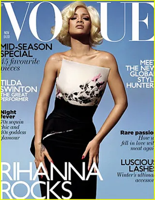 Rihanna - Rihanna reinvents herself on British Vogue's November issue. The star strikes a bold pose in a short blonde wig and Armani Prive couture.(Photo: Courtesy Vogue magazine)