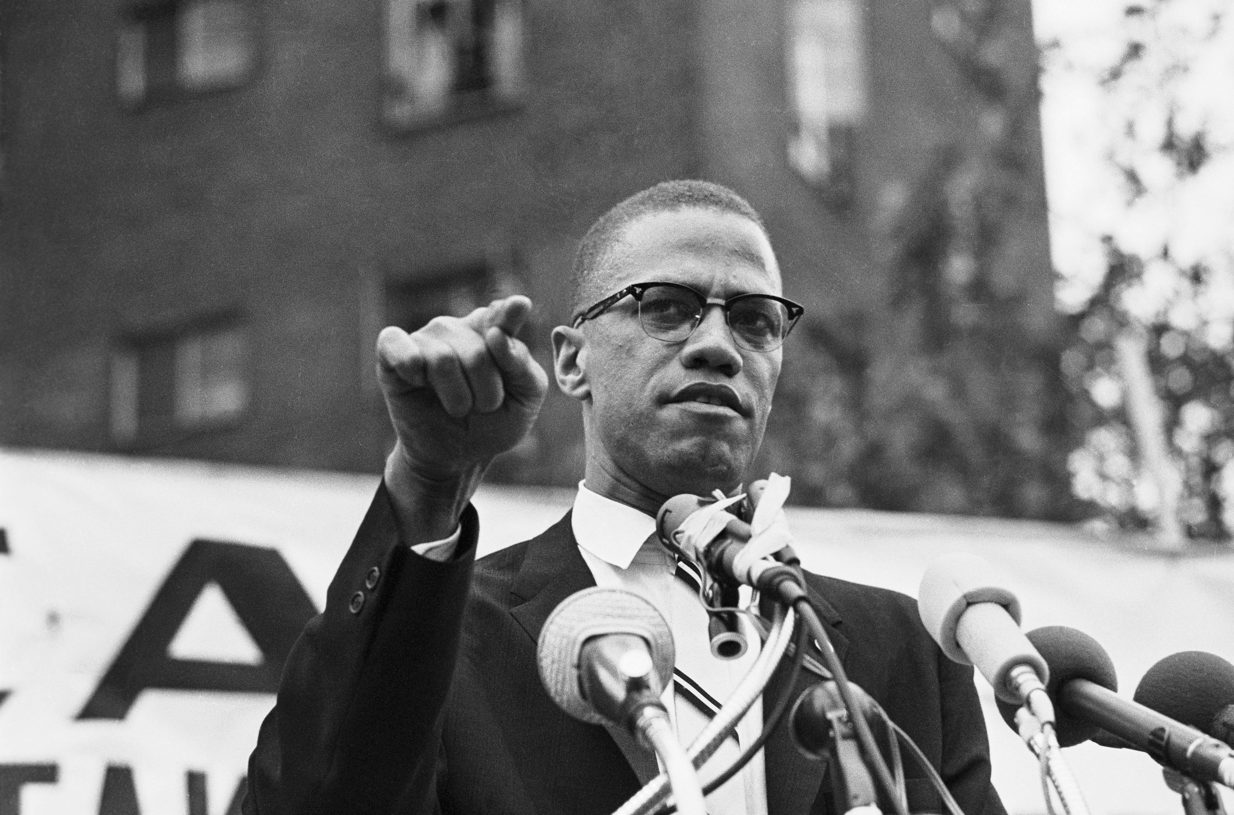 Nation of Islam leader Malcolm X draws various reactions from the audience as he restates his theme of complete separation of whites and African Americans. The rally outdrew a Mississippi-Alabama Southern Relief Committee civil rights event six blocks away 10 to 1.