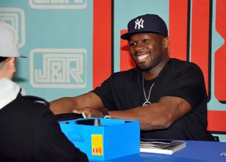 Hip Hop Mogul - 50 Cent is all smiles while greeting fans at the promotional in-store for his new STREET by 50 &amp; SYNC by 50 headphones at J&amp;R Music World&nbsp; in New York City. (Photo: Theo Wargo/Getty Images)