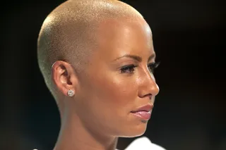 Amber Rose - Not the least bit amused when DJ Jamieson Hill threw a record and drink into the crowd.  (Photo: Moses Mitchell/BET)