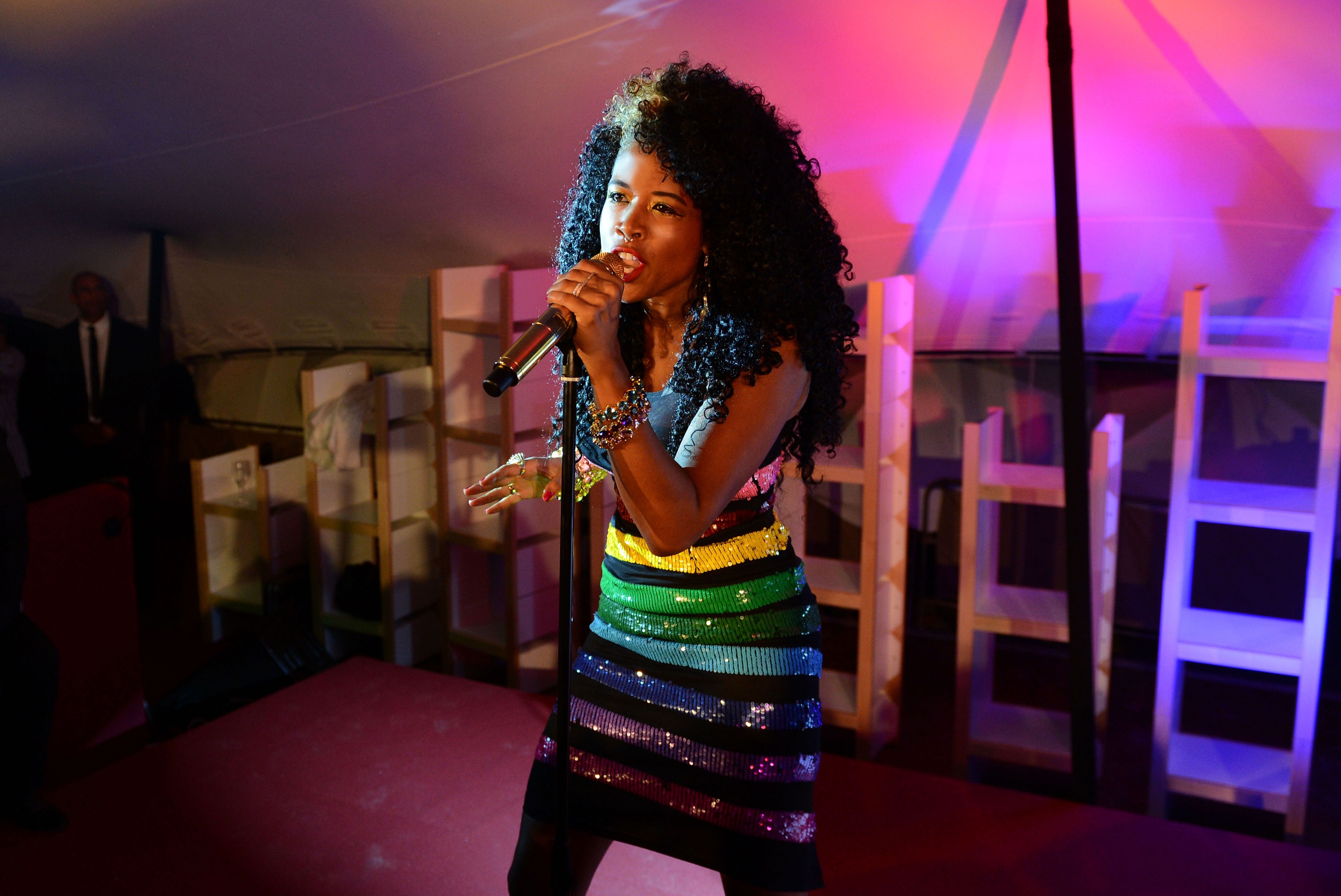 Curls, Curls, Curls - Kelis has got her curls back. Remember when she rocked a blonde curly 'do with pink tips in her debut video "Caught Out There?" Here, the singer performs during the Abu Dhabi Digital Domain Event at the 65th Cannes Film Festival at Plage de La Quinzaine des Realisateurs in Cannes, France.(Photo: Andrew H. Walker/Getty Images)