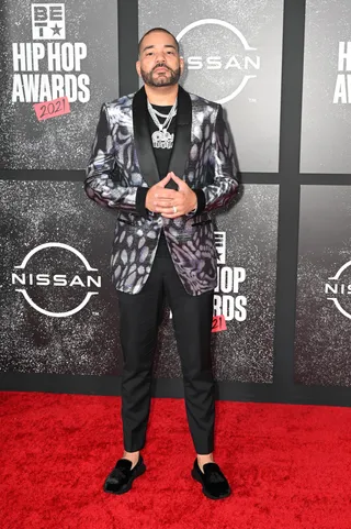 DJ Envy exuded swag in his custom gun metal colored suit. - (Photo by Paul R. Giunta/FilmMagic)