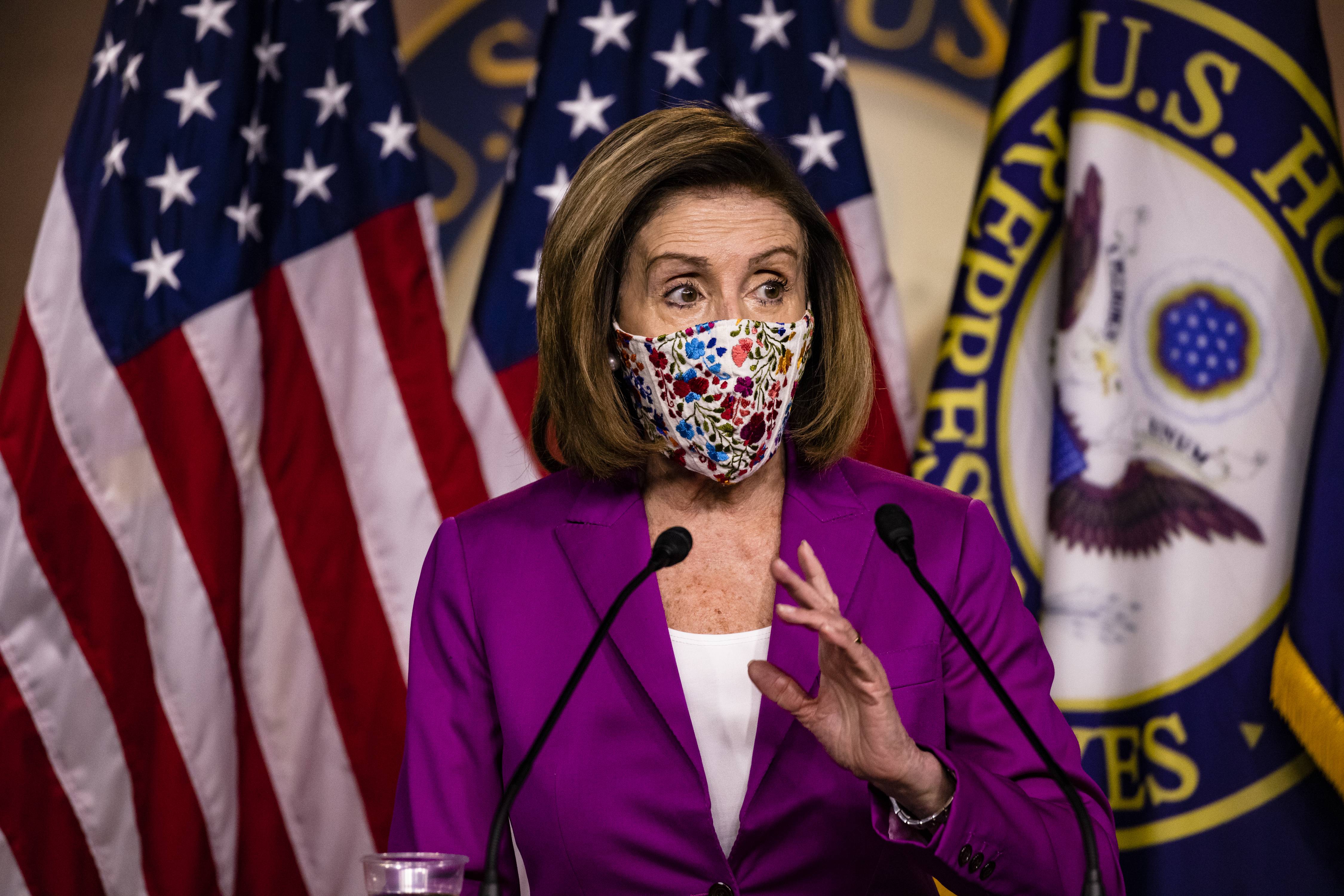 WASHINGTON, DC - JANUARY 07: Speaker of the House Nancy Pelosi calls for the removal of President Donald Trump from office either by invocation of the 25th Amendment by Vice President Mike Pence and a majority of the Cabinet members or Impeachment at the U.S. Capitol on January 7, 2021 in Washington, DC. Following a rally yesterday with President Donald Trump on the National Mall, a pro-Trump mob stormed and broke into the U.S. Capitol building causing the Joint Session of Congress to delay the certification of President-elect Joe Biden’s victory over President Trump. (Photo by Samuel Corum/Getty Images) *** Local Caption *** Nancy Pelosi