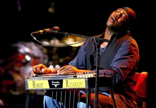 Inspiration to Aspiration\r - Robert was inspired by Stevie Ray Vaughan when he was given tickets to one of Vaughan's shows and saw him play the pedal steel guitar.\r(Photo: Scott Wintrow/Getty Images)