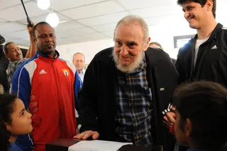 Fidel Castro Votes in Cuban Election - The 86-year-old Cuban revolutionary leader Fidel Castro made a surprise appearance in Havana to cast his ballot in the parliamentary election. Castro reportedly spent up to an hour gabbing with other voters and the media while at the polling place.&nbsp; (Photo: AP Photo/Ismael Francisco, Cubadebate)