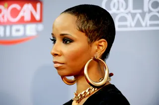 Hoop Dreams - We can’t decide which we love more — the R&amp;B singer&nbsp;Vivian Green's ultra-smooth cut (edges laid for days!) or her larger-than-life gold hoops and thick curb chain necklace.   (Photo: Bryan Steffy/BET/Getty Images)