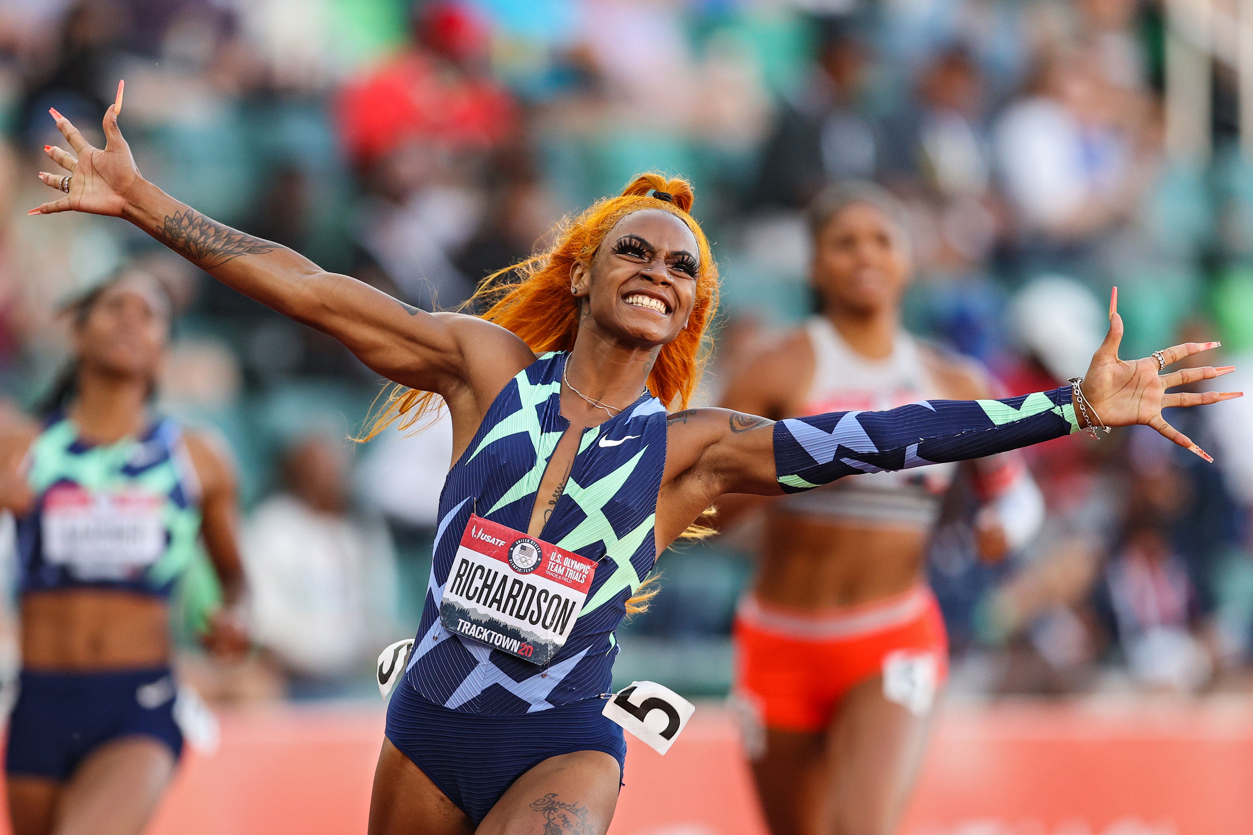 EUGENE, OREGON - JUNE 19: Sha'Carri Richardson celebrates winning the Women's 100 Meter final on day 2 of the 2020 U.S. Olympic Track & Field Team Trials at Hayward Field on June 19, 2021 in Eugene, Oregon. (Photo by Patrick Smith/Getty Images)
