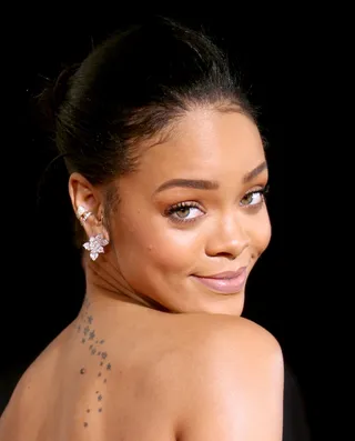 Grammy Game Strong - She shut down the 2015 Grammys red carpet in ear cuffs by Colette Jewelry and Chopard diamonds. Flawless.(Photo: Dan MacMedan/WireImage)