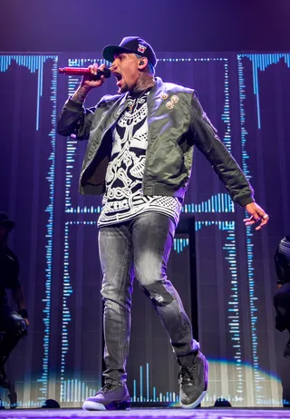 Run It - Chris Brown gets the crowd open as he looks for a &quot;New Flame.&quot;(Photo: Scott Legato/Getty Images)