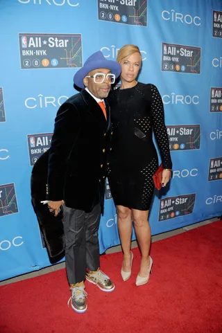 Spike Lee and Tonya Lewis Lee - It's date night for the famed filmmaker and his wife on Sunday as they pose on the red carpet before taking their front row seats among the star-studded audience at the NBA All-Star game in New York City.&nbsp;  (Photo: Brad Barket/Getty Images)