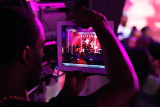 Side View - An audience member gets a chance to tape the amazing Fantasia performing.(Photo by Cindy Ord/BET/Getty Images for BET)