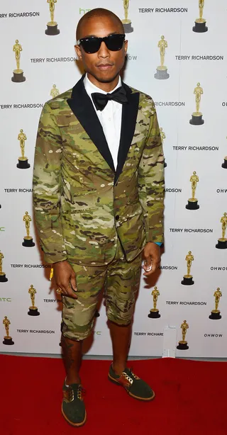 Don't Blend In - Pharrell Williams rocks a camouflage short suit at the OHWOW and&nbsp;HTC celebration of the release of "Terrywood" with Terry Richardson at the Standard Hotel and Spa in Miami Beach, Florida. (Photo: Frazer Harrison/Getty Images for HTC)