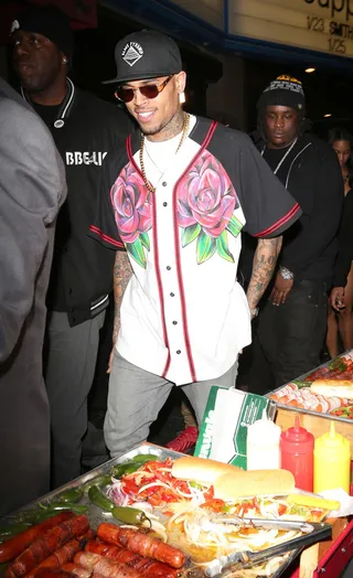 Up in the Club - Chris Brown loves a party. The singer was spotted once again leaving Supper nightclub in Hollywood with his entourage on his way back to his red Ferrari.&nbsp;(Photo: PacificCoastNews.com)