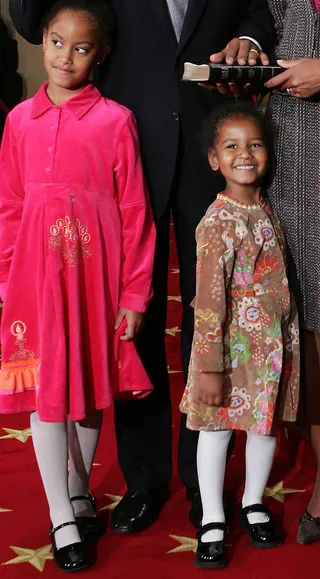 Two of a Kind - The future fashion trendsetters posed in matching tights and glossy Mary Janes in 2005. (Photo: Alex Wong/Getty Images)