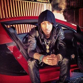 Future @freeband_pro - &quot;Turn on the Lights&quot; rapper Future takes a pic in this shiny red Bugatti.&nbsp;(Photo: Instagram via Future)