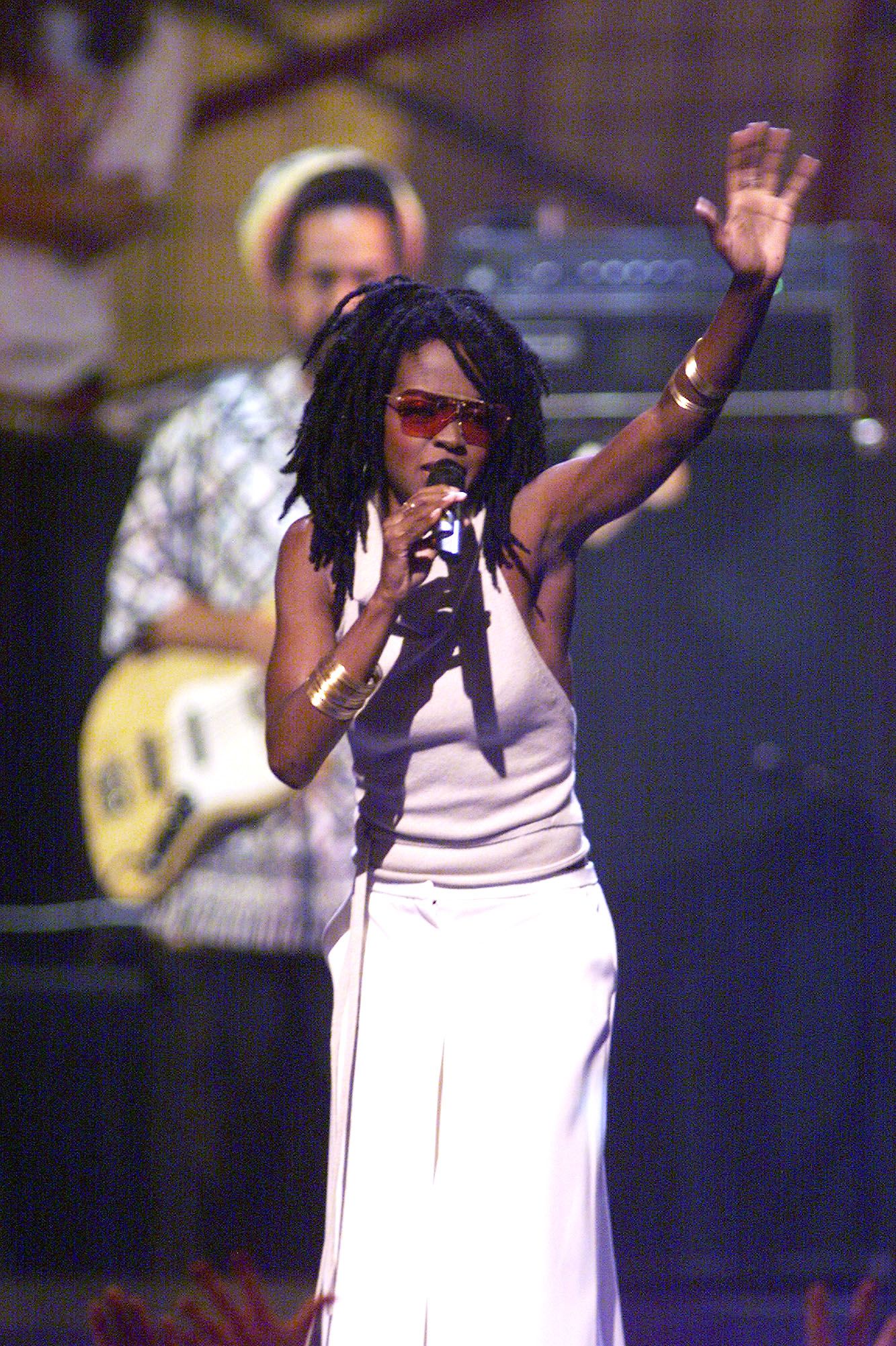 One Mic - In 1998, Lauryn Hill launched her solo career with the critically acclaimed album, The Miseducation of Lauryn Hill. The album was a complete hit, thanks to smash singles "Ex-Factor," "Lost Ones," and "Doo Wop (That Thing)." The LP earned the singer five Grammy Awards including "Album of the Year" and "Best New Artist."&nbsp;(Photo by Frank Micelotta/ImageDirect)