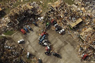 Homes Destroyed - A destroyed apartment complex in Joplin.(Photo: AP Photo/Charlie Riedel)