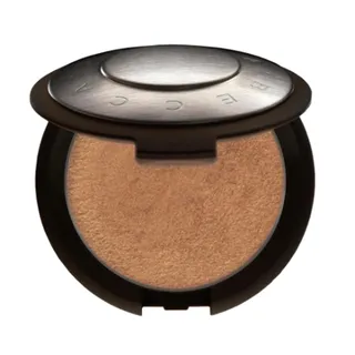 Becca Shimmering Skin Perfector Pressed ($38) - Are you late to the strobing party? Check out our easy tutorial&nbsp;and then bathe your cheekbones in this golden bronze highlighter.  (Photo: Becca)