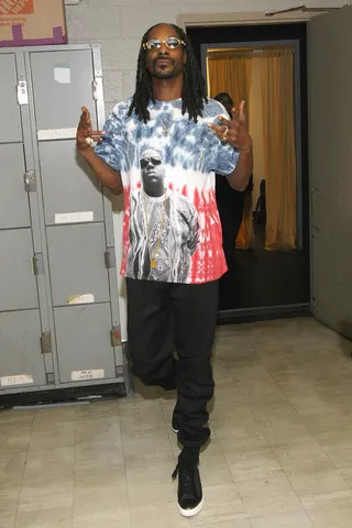 Peep The T-Shirt - It's not everyday that you see a rap legend big up another rap legend on their attire. Snoop's been doing it for hip hop for over 20 years so repping Biggie is an appropriate salute.(Photo: Bennett Raglin/BET/Getty Images for BET Networks)