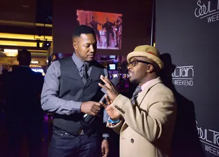 Flexin'  - Flex Alexander has a one-on-one with Rapper Kwame at the Soul Train Weekend Kick-Off Party.&nbsp; (Photo: Earl Gibson/BET/Getty Images for BET)