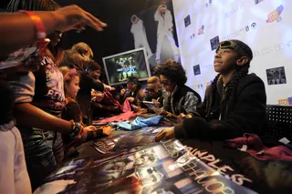 All Smiles - Smiling and signing at BET's 106 &amp; Park.(Photo: John Ricard/BET)