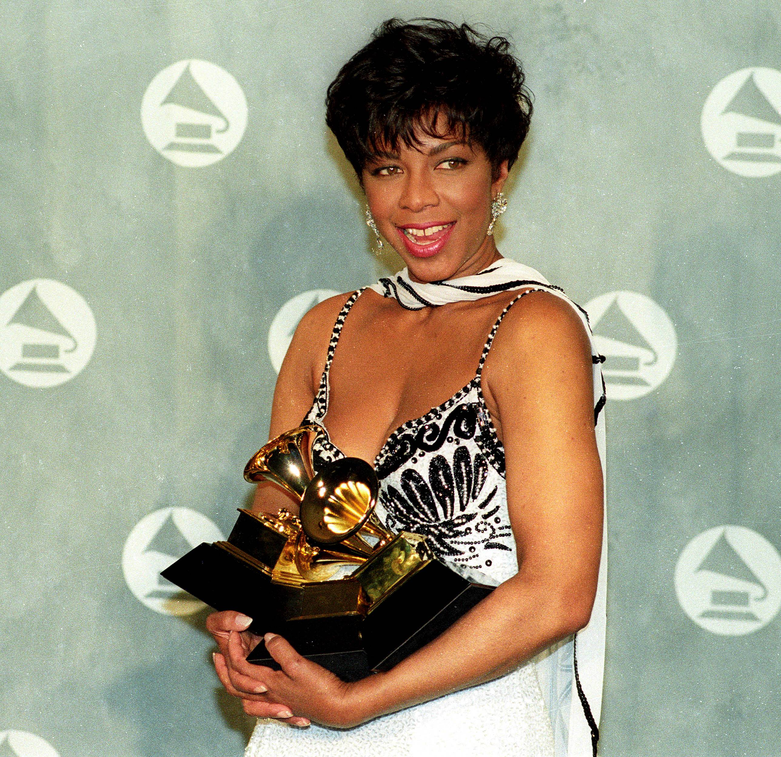 Natalie Cole, Unforgettable…With Love, 1992 - Natalie Cole, daughter of leading jazz pianist Nat King Cole, recorded Unforgettable…With Love, an album full of covers of her father's music. The album, which has since been certified seven times platinum, won the 1992 Grammy Award for Album of the Year.(Photo: Greta Pratt/Reuters)