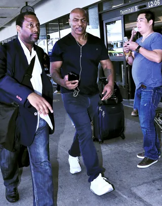 Making Moves - Former heavyweight champion of the world Mike Tyson moves stealthily through LAX airport.(Photo: Cathy Gibson, PacificCoastNews)