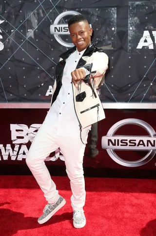 Silento - The rapper who brought us the Nae&nbsp;Nae&nbsp;also brings his unique sense of style to the red carpet by adding a funky black-and-ivory jacket to his all white getup.&nbsp; (Photo: Frederick M. Brown/Getty Images for BET)