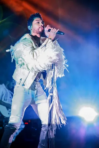 Rock Star Style - Miguel performs in a leather jacket covered in feathers and fringe at O2 Academy Brixton in London.(Photo: Christie Goodwin/Redferns)