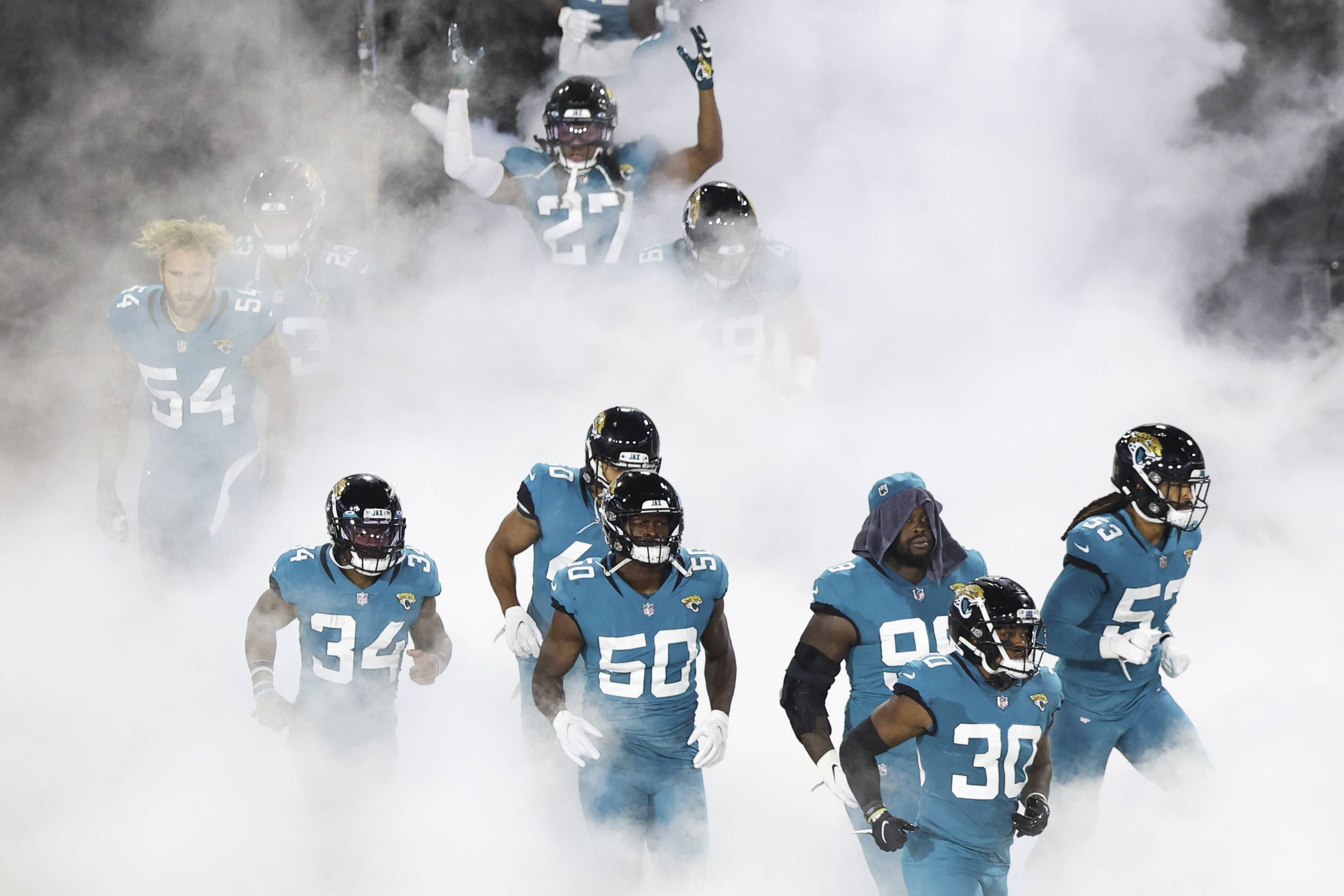 JACKSONVILLE, FLORIDA - SEPTEMBER 24: The Jacksonville Jaguars enter the field before the start of a game against the Miami Dolphins at TIAA Bank Field on September 24, 2020 in Jacksonville, Florida. (Photo by James Gilbert/Getty Images)