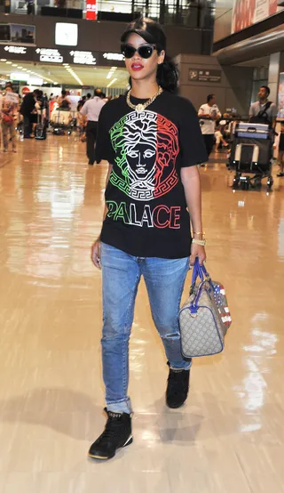 All Around the World - Rihanna, spotted arriving at the Narita International Airport in Narita, Japan, continues her travels around the globe. The Bajan beauty, who just completed a fabulous yacht vacation in the French Riviera, sports a Caesar's Palace T-shirt with the colors of the Italian flag and an American Flag printed Gucci handbag. &nbsp;(Photo: Jun Sato/WireImage)