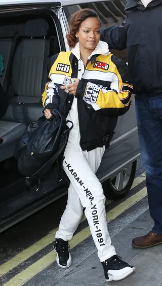 On the Move - Rihanna rocks a sporty look as she heads into her hotel in London. (Photo: Neil Mockford/FilmMagic)