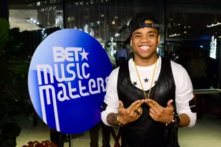 All Smiles - Grammy nominee Mack Wilds smiles for the camera before laying down a memorable performance in front of a star-studded crowd in Los Angeles.&nbsp;(Photo: Noel Vasquez/Getty Images for BET)