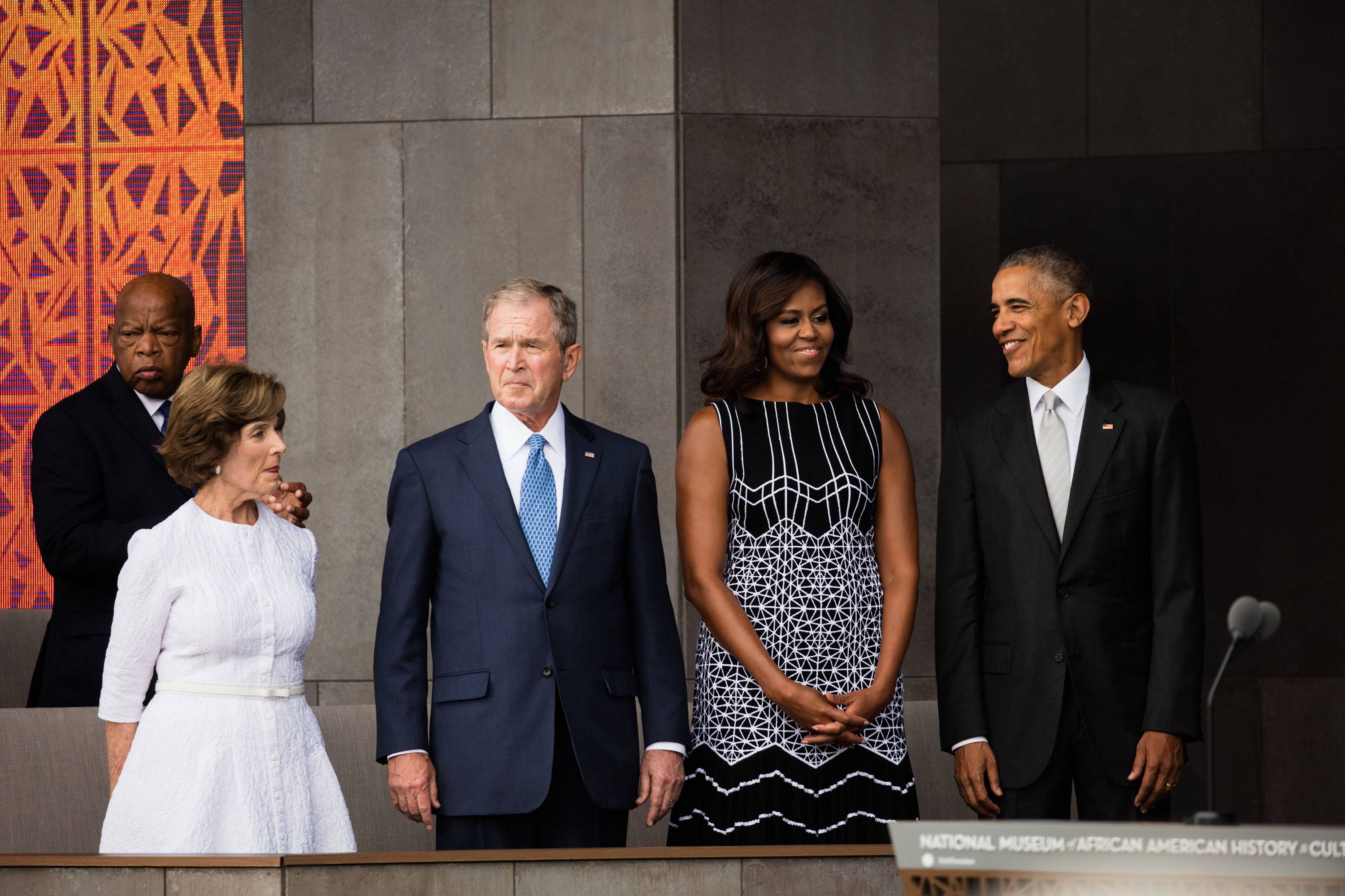 View of, from left, Congressman John Lewis, former First Lady Laura Bush, former President George W Bush, First Lady Michelle Obama, and President Barack Obama as they attend the opening of the National Museum of African American History and Culture, Washington DC, September 24, 2016. (Photo by David Hume Kennerly via Bank of America/Getty Images)